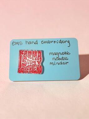 Red 'KARMA IS MY BOYFRIEND'- Magnetic Needle Minder